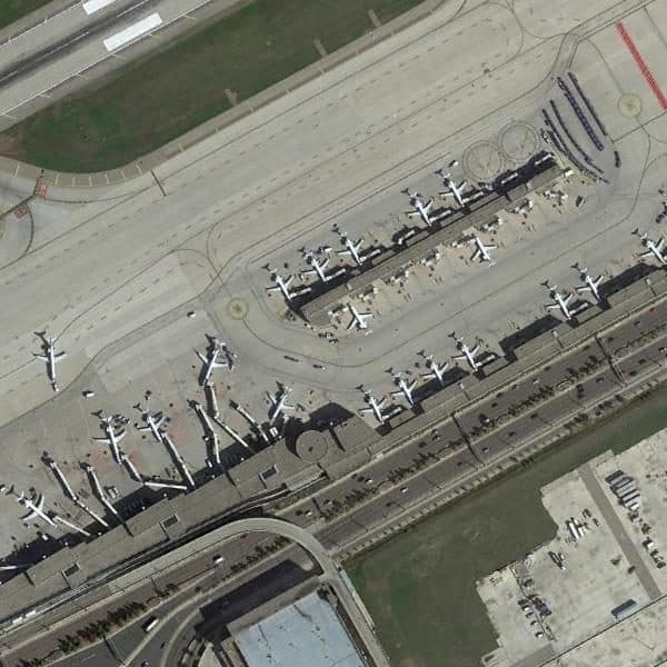 Aerial view of airport with aircraft detected